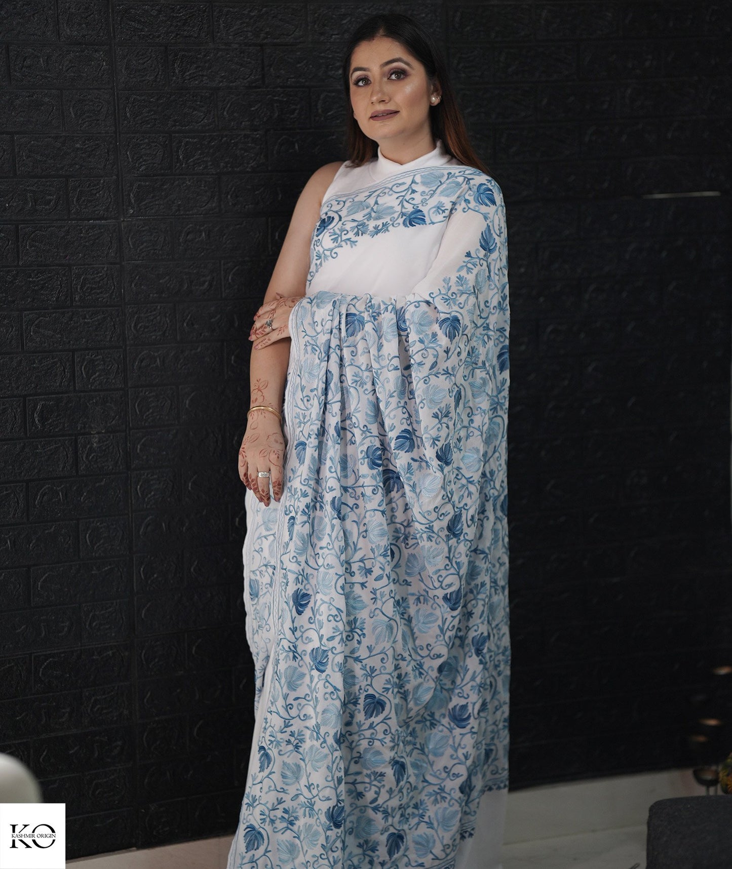 Skyish Blue Embroidered White Georgette Saree