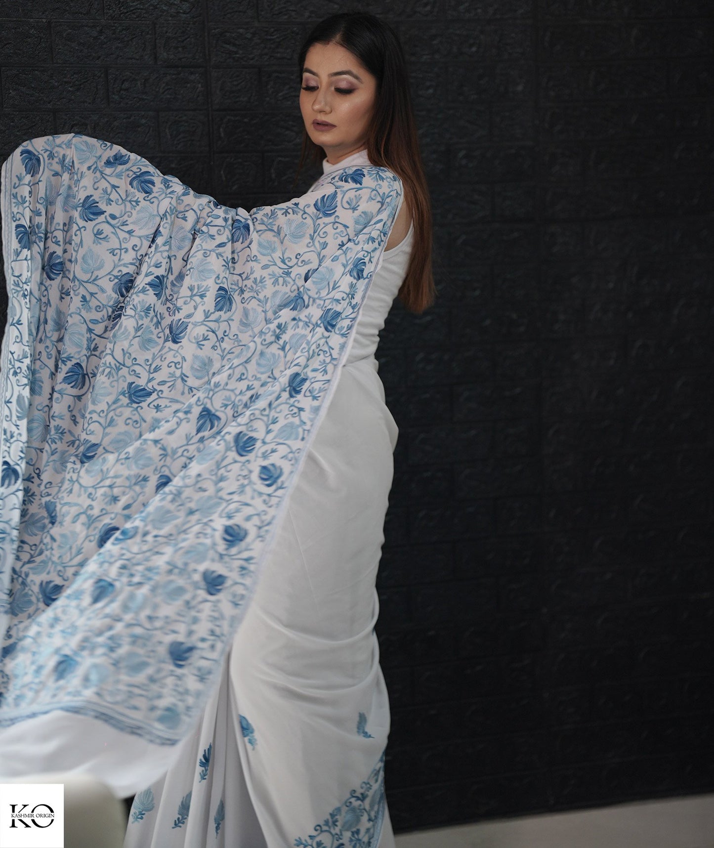 Skyish Blue Embroidered White Georgette Saree