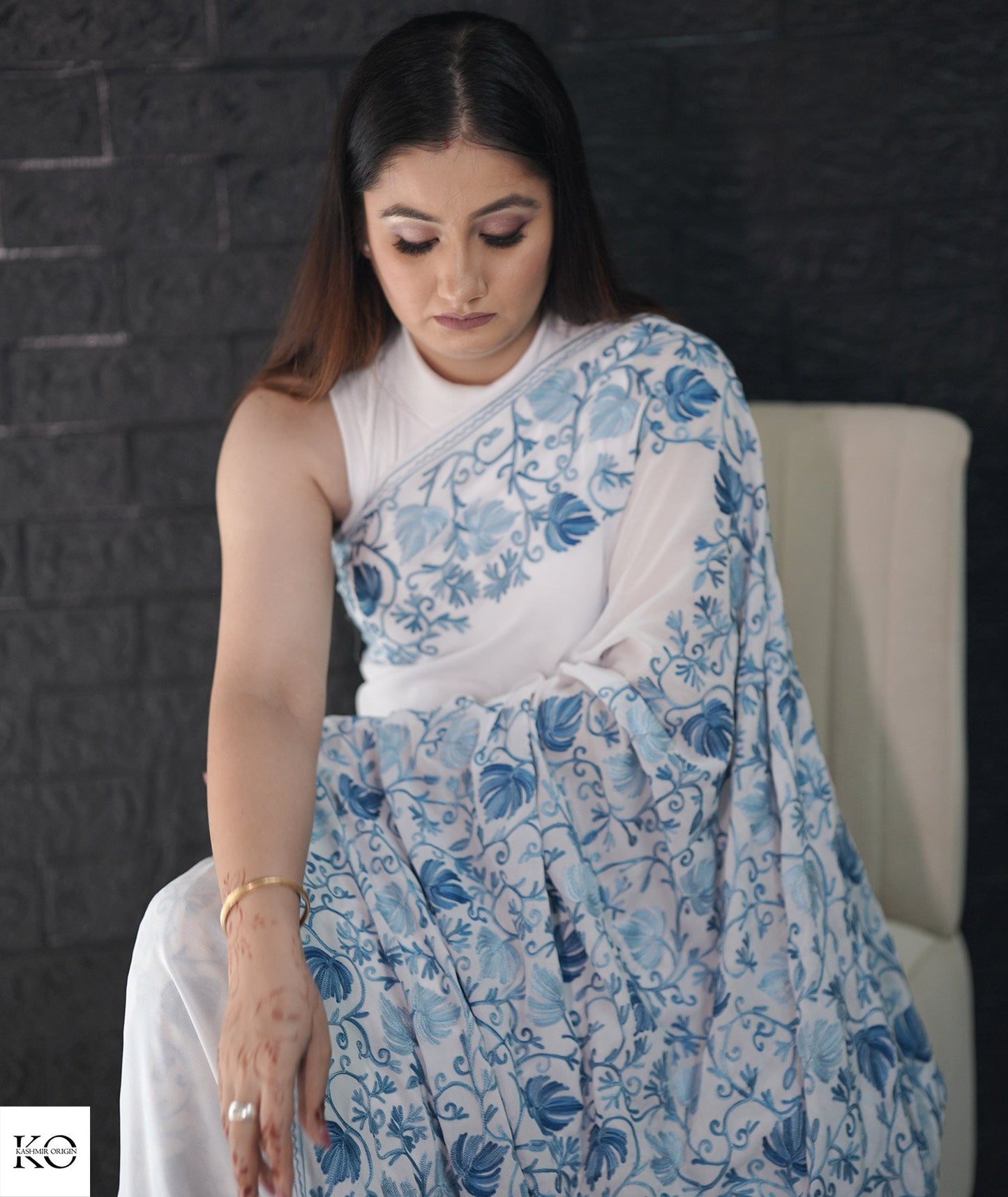 Skyish Blue Embroidered White Georgette Saree