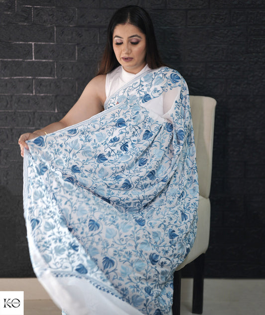 Skyish Blue Embroidered White Georgette Saree