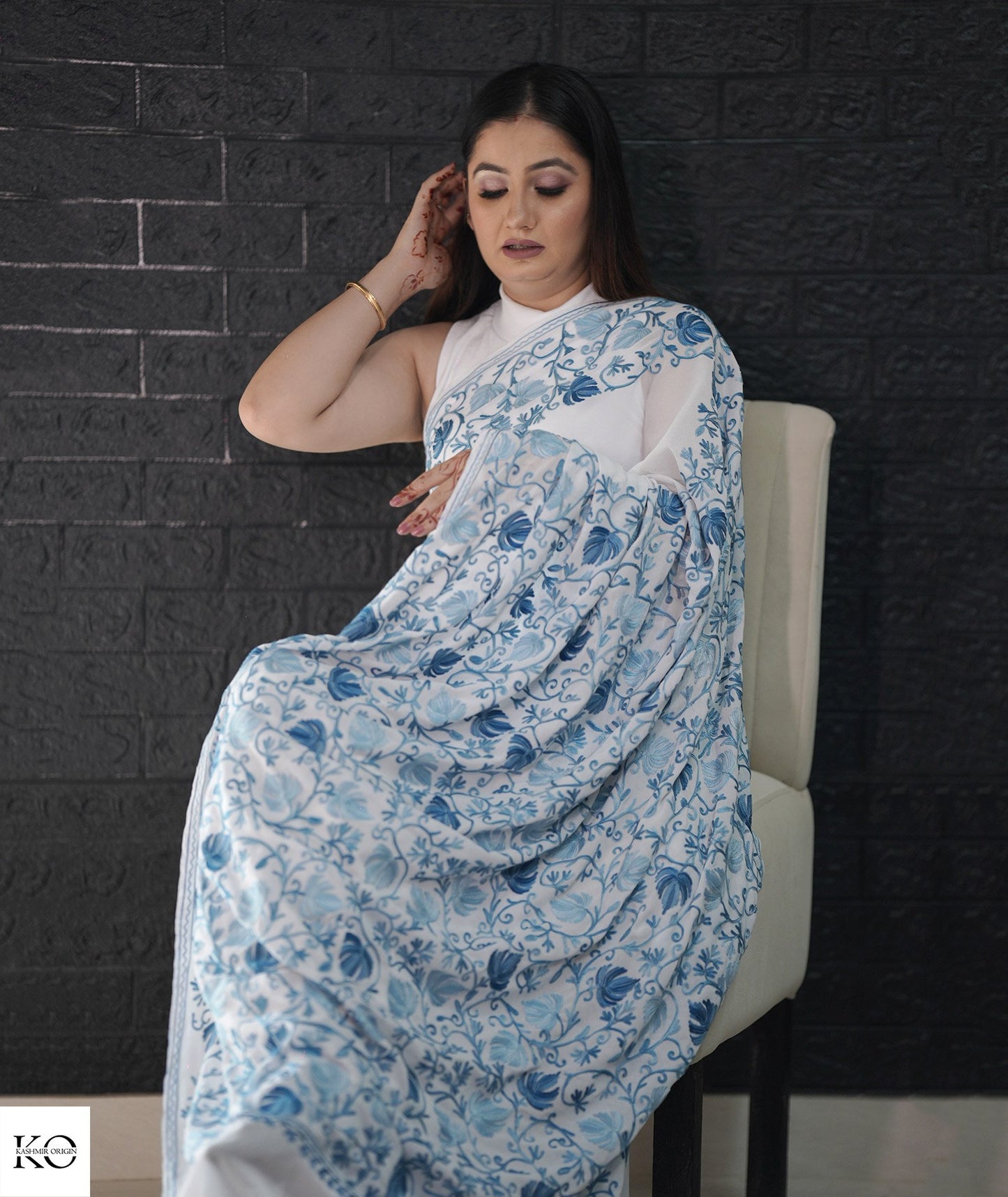 Skyish Blue Embroidered White Georgette Saree