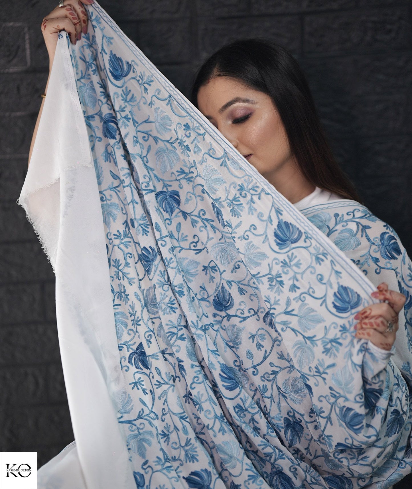 Skyish Blue Embroidered White Georgette Saree