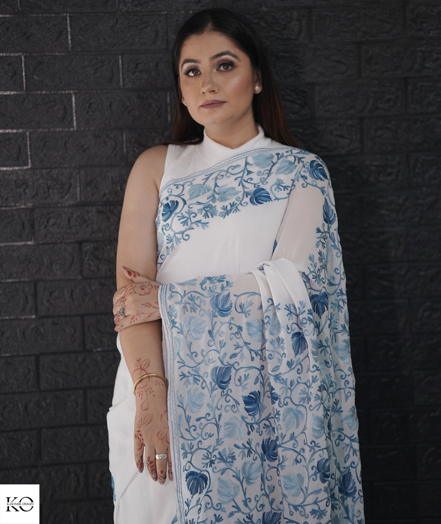 Skyish Blue Embroidered White Georgette Saree