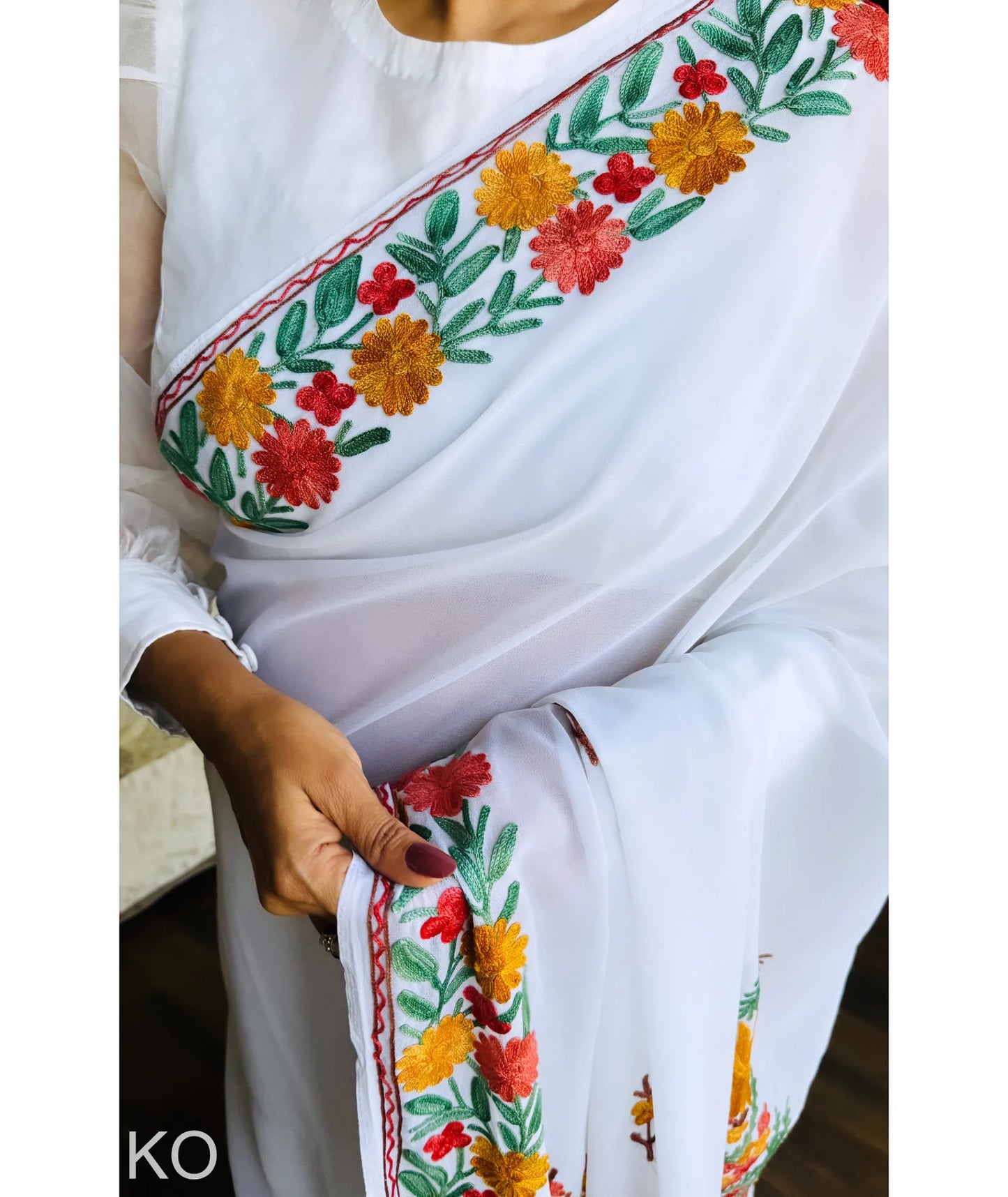 Gulbahaar Aari Embroidered White Georgette Saree