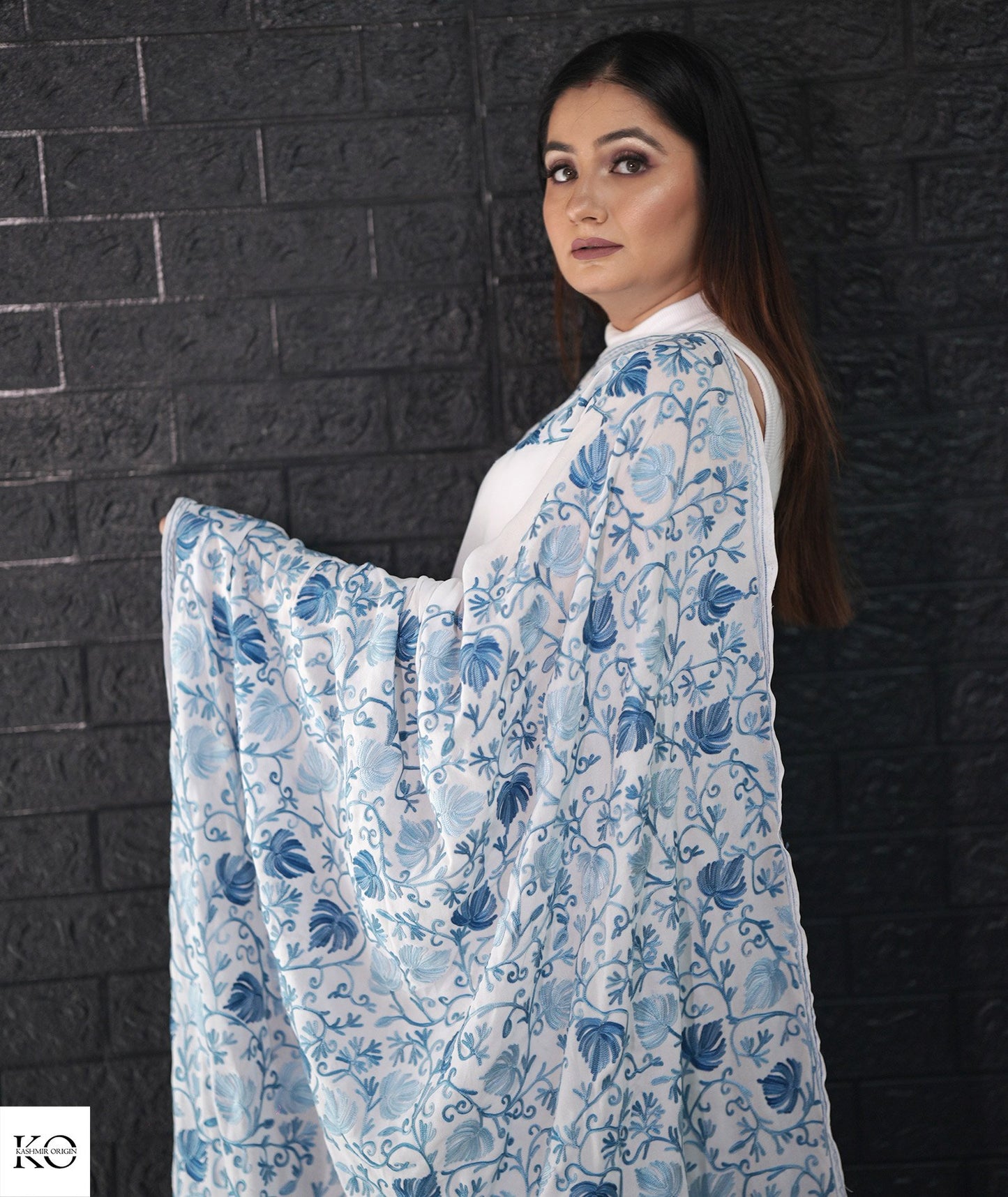 Skyish Blue Embroidered White Georgette Saree