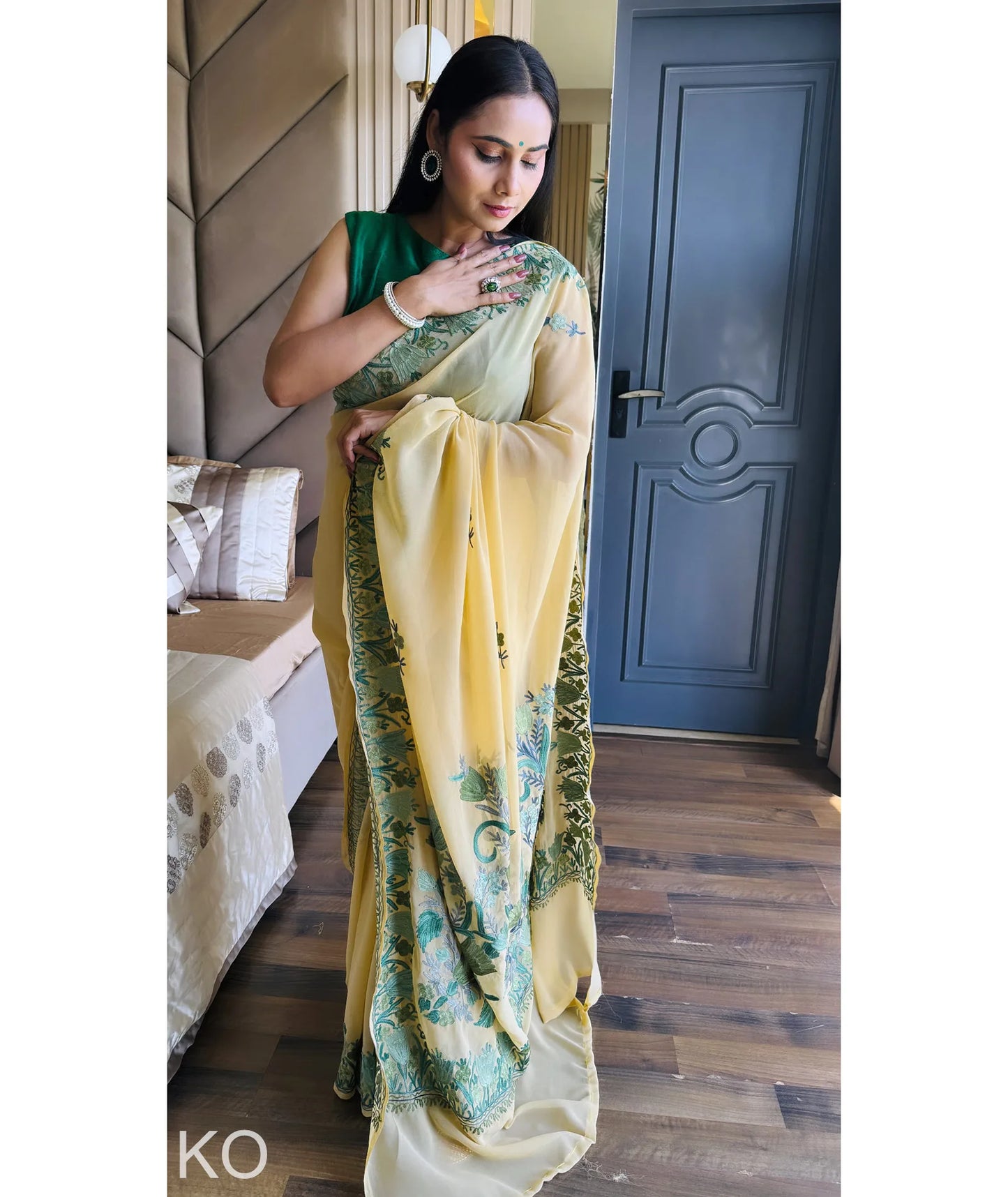 Green Tulips Aari Embroidered yellow Georgette Saree