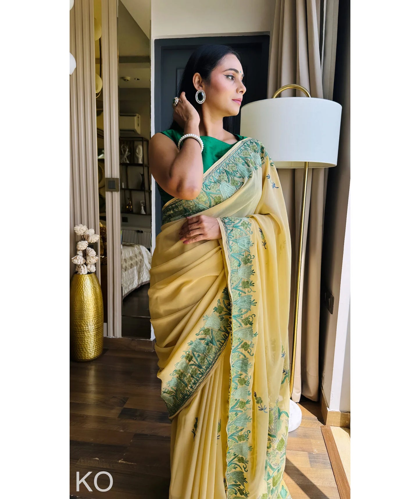 Green Tulips Aari Embroidered yellow Georgette Saree