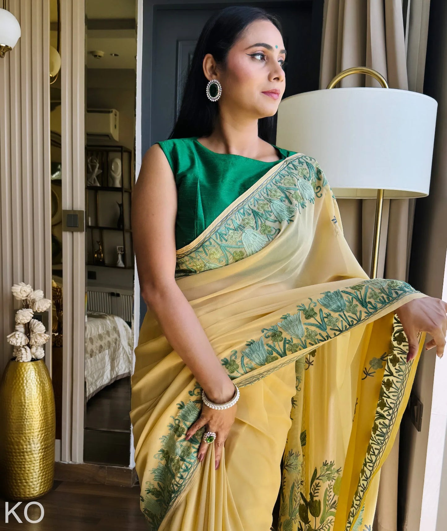 Green Tulips Aari Embroidered yellow Georgette Saree