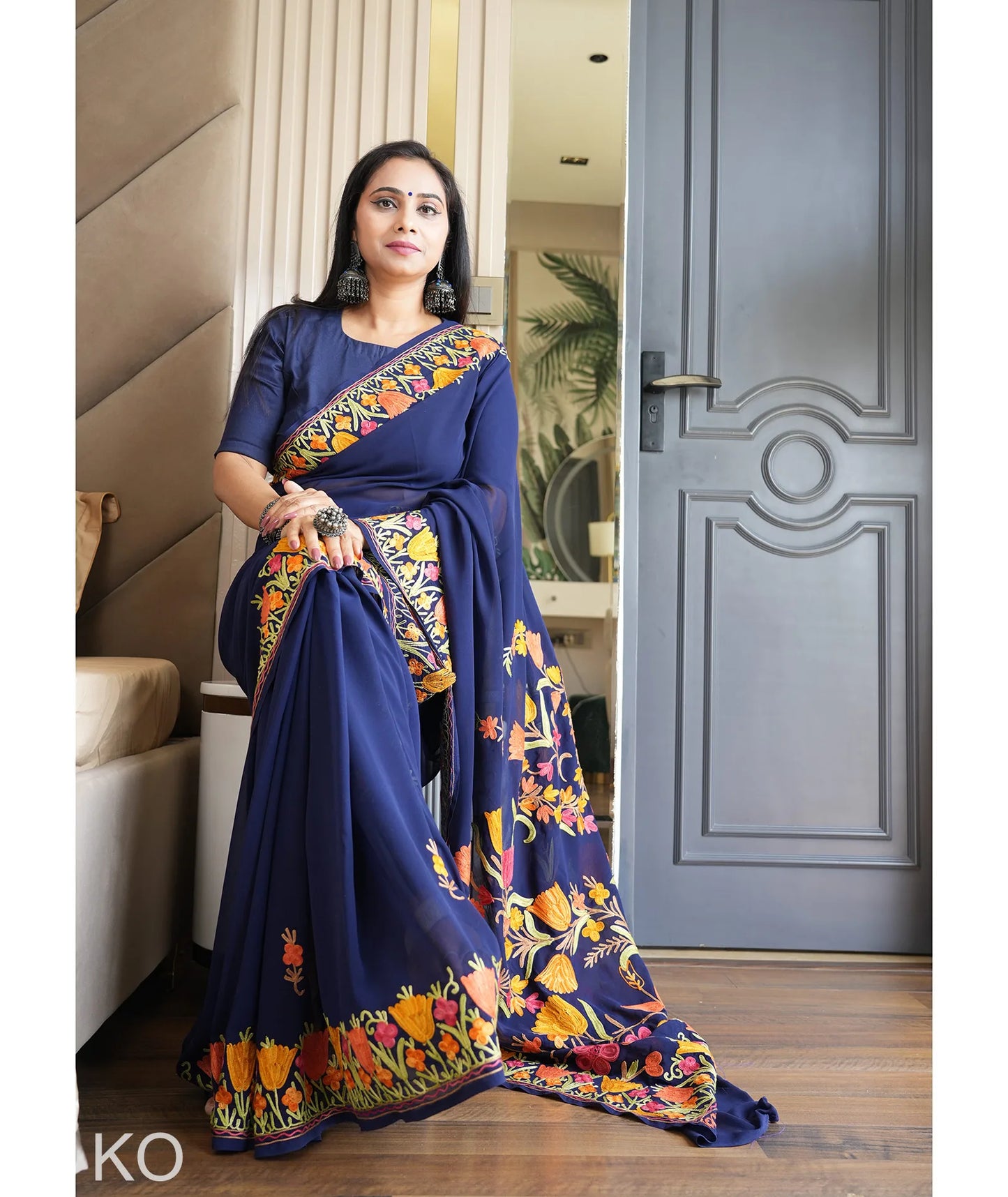 Tulip Design Aari Embroidered Blue Georgette Saree