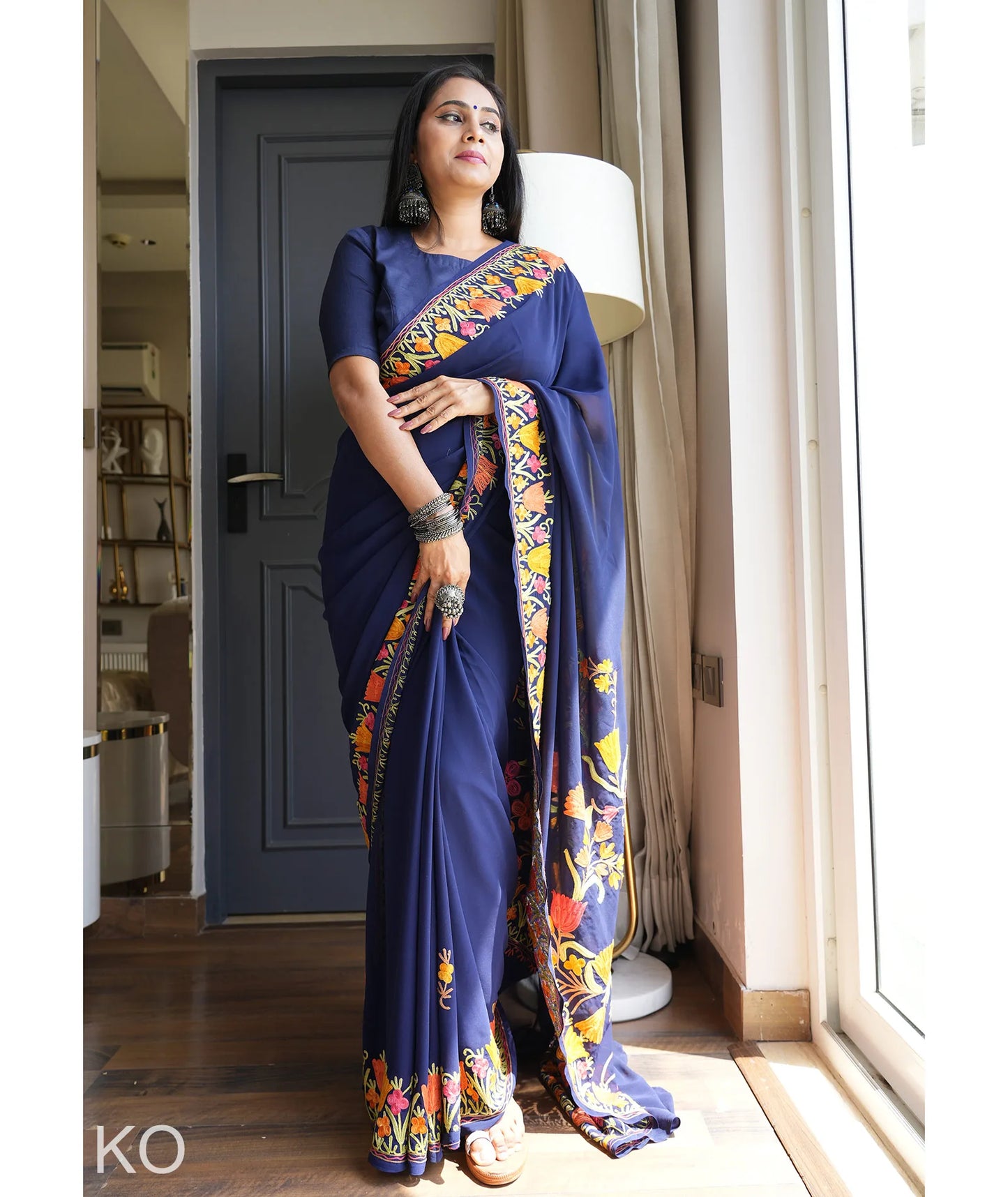 Tulip Design Aari Embroidered Blue Georgette Saree