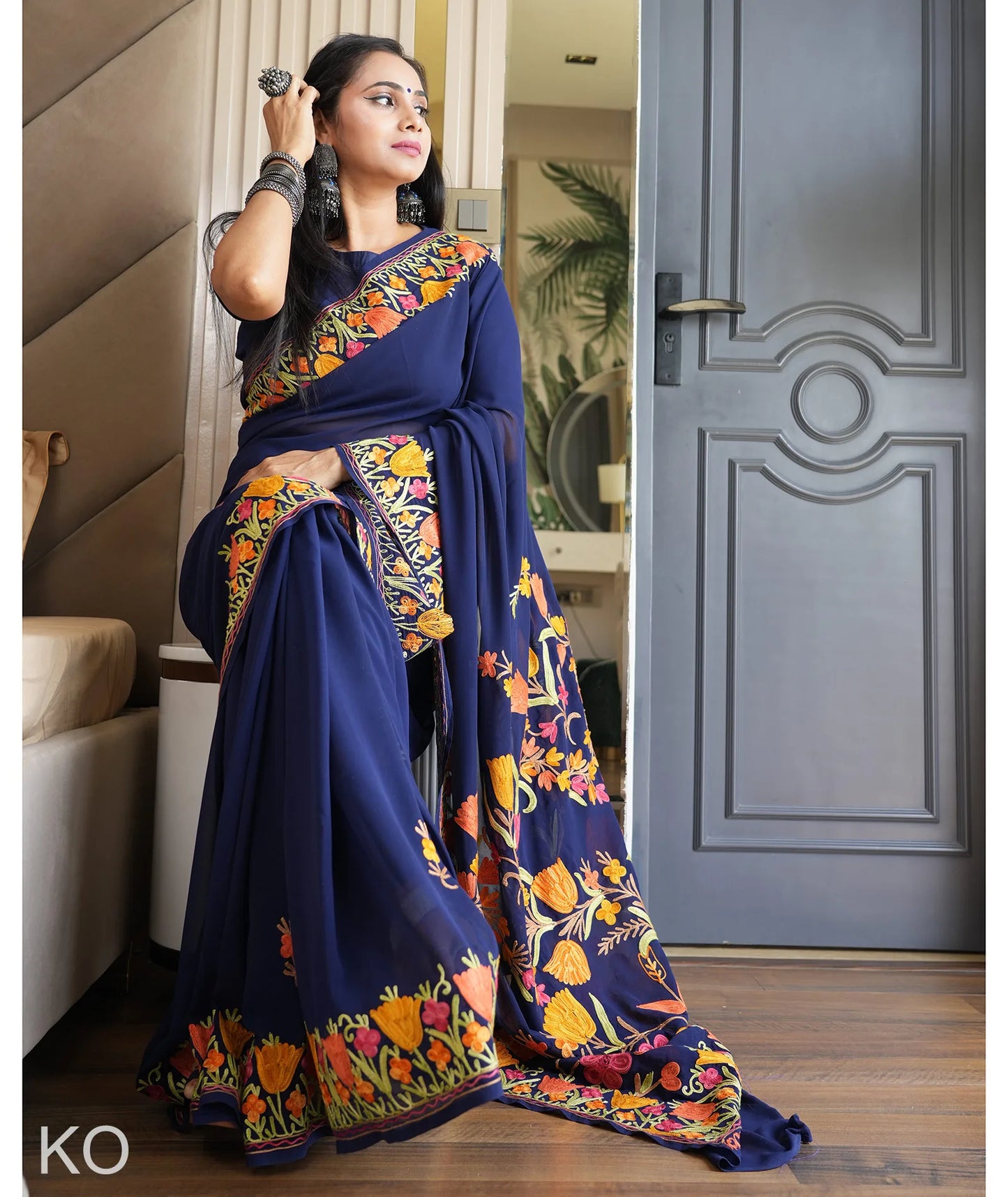 Tulip Design Aari Embroidered Blue Georgette Saree