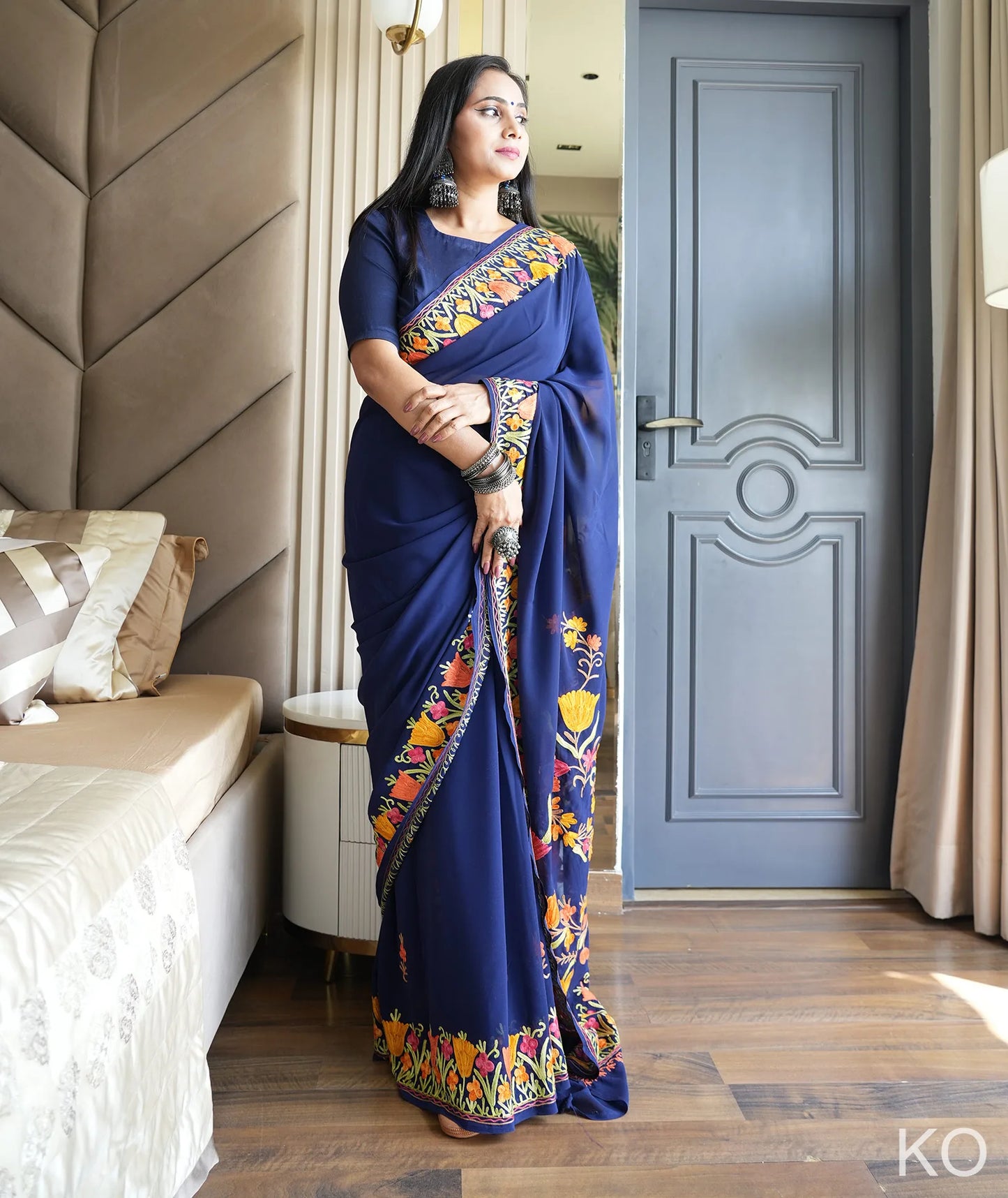 Tulip Design Aari Embroidered Blue Georgette Saree