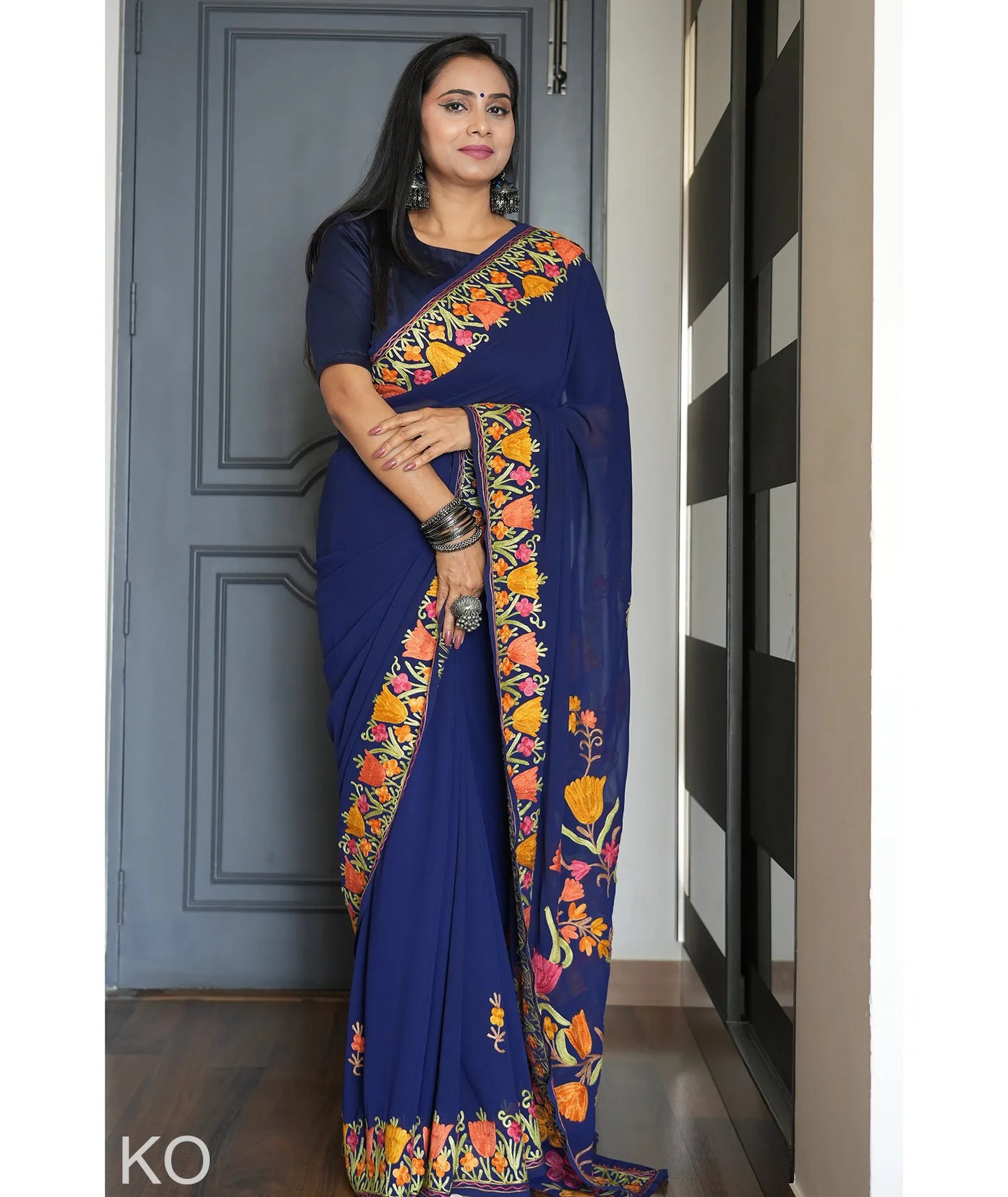 Tulip Design Aari Embroidered Blue Georgette Saree