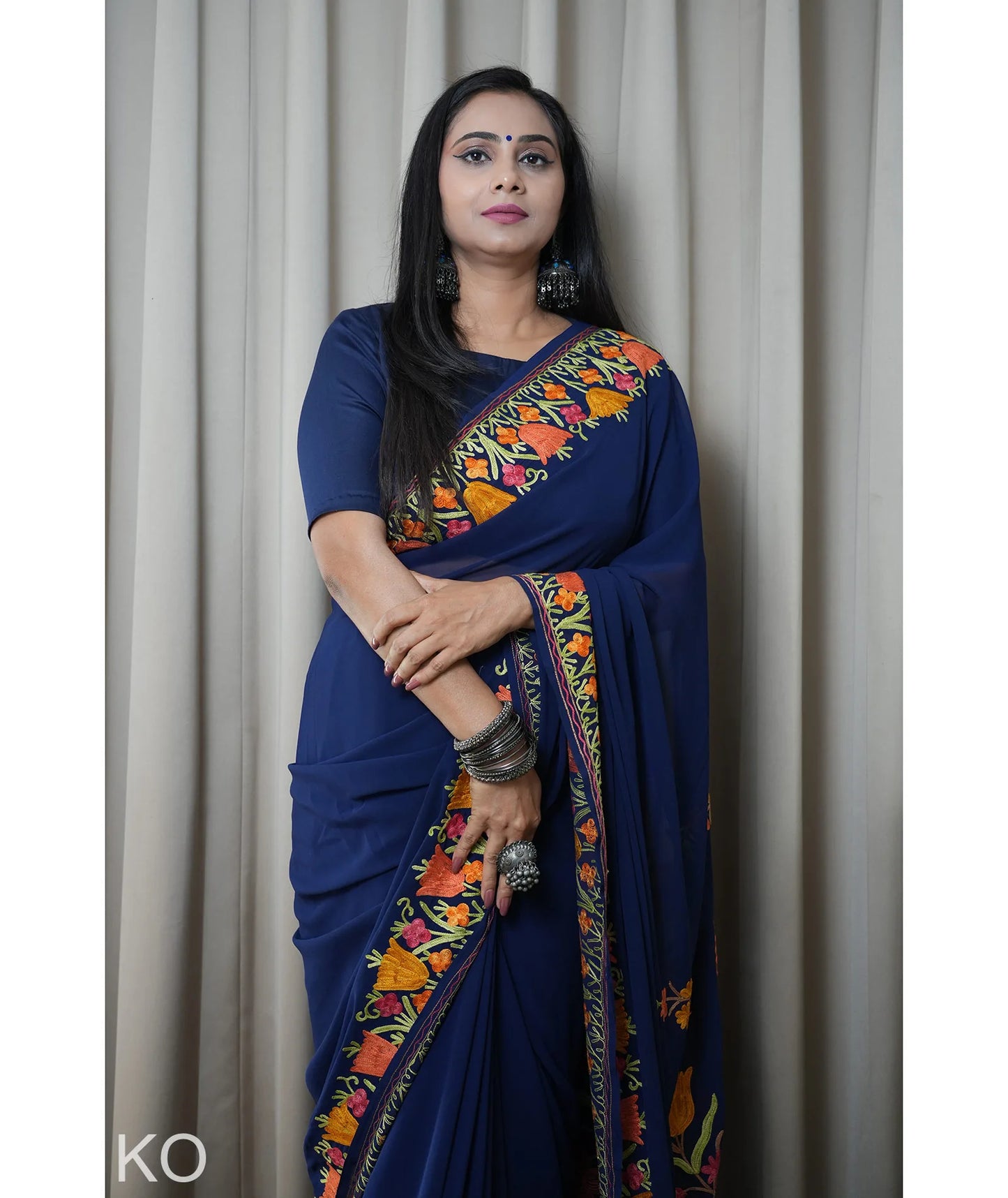 Tulip Design Aari Embroidered Blue Georgette Saree