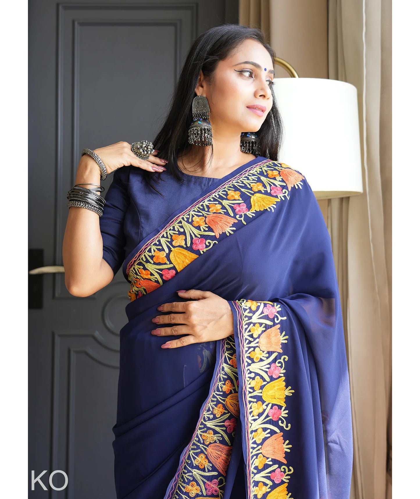 Tulip Design Aari Embroidered Blue Georgette Saree