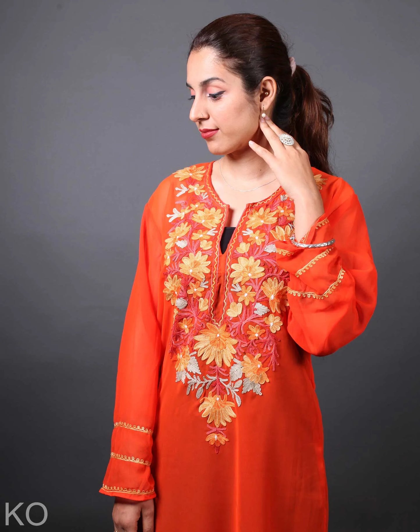 Orange  Shade Floral Design Aari Embroidery Georgette Kurti