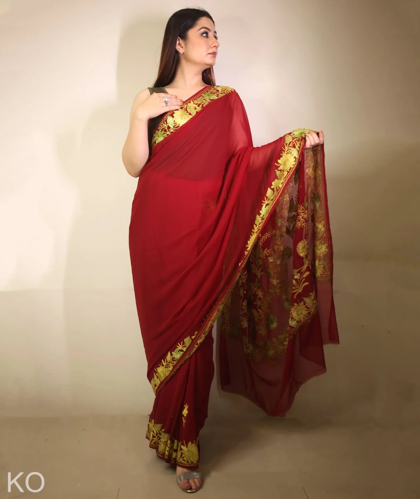 Soft Green Embroidered Maroon Georgette Saree