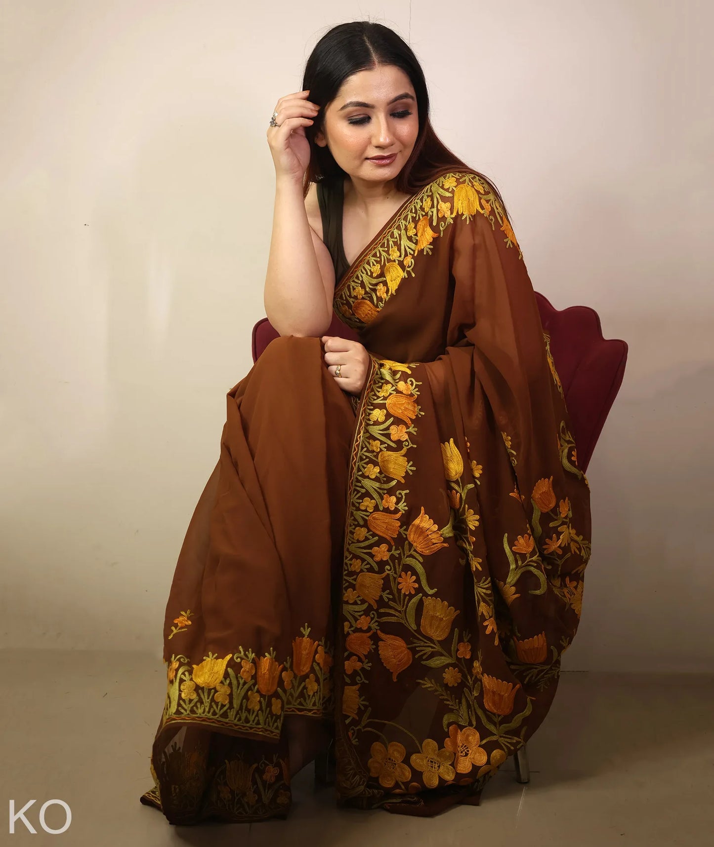 Tulip Design Embroidered Brown Georgette Saree