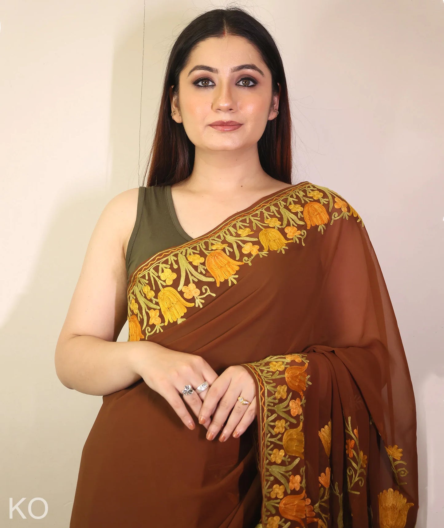 Tulip Design Embroidered Brown Georgette Saree