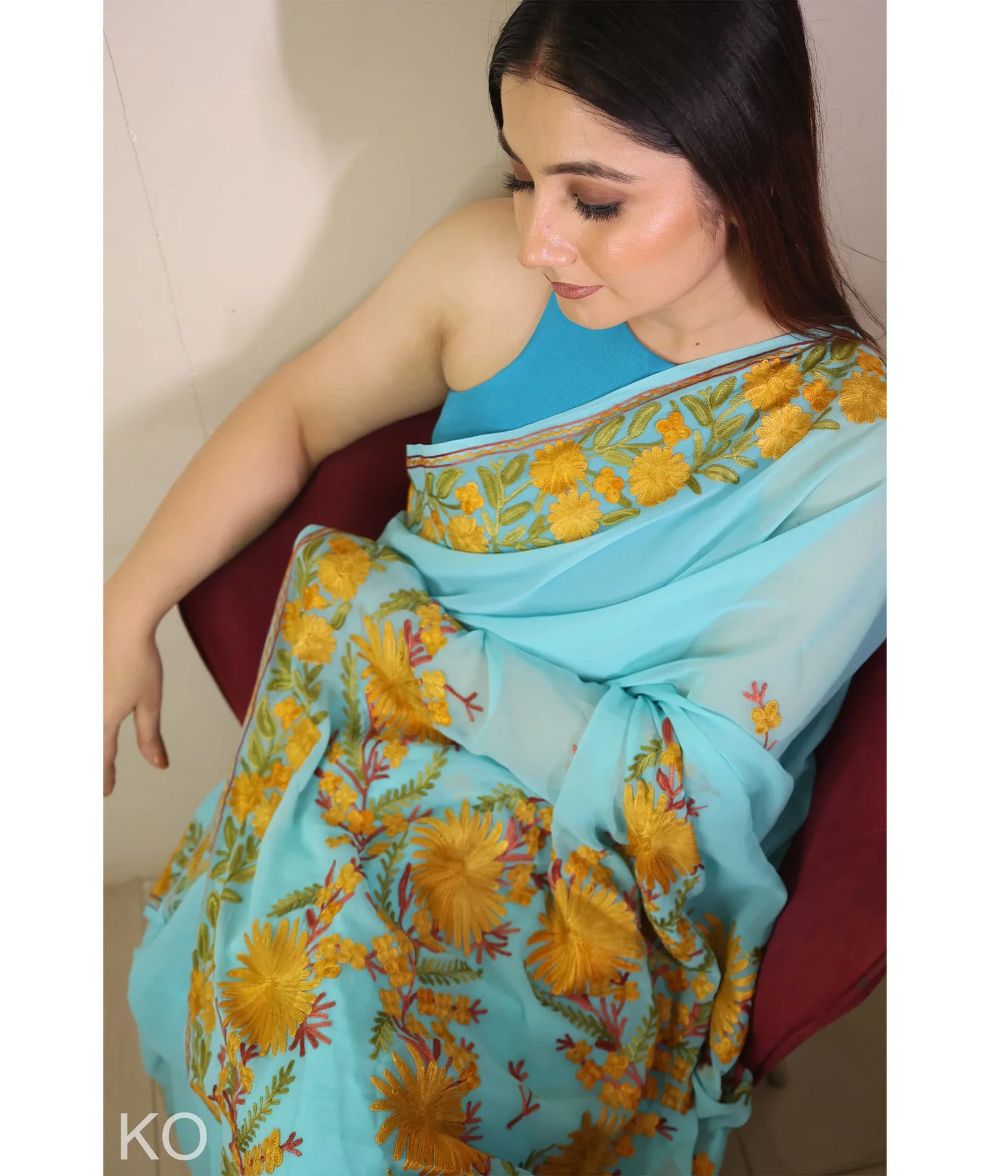 Turquoise Embroidered Georgette Saree