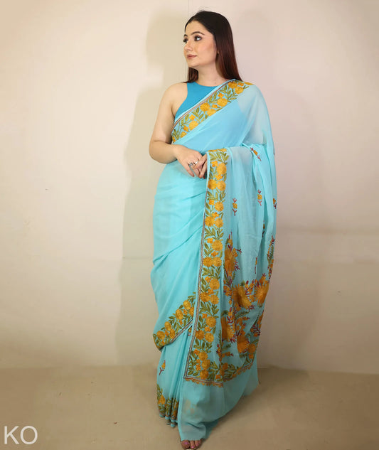 Turquoise Embroidered Georgette Saree