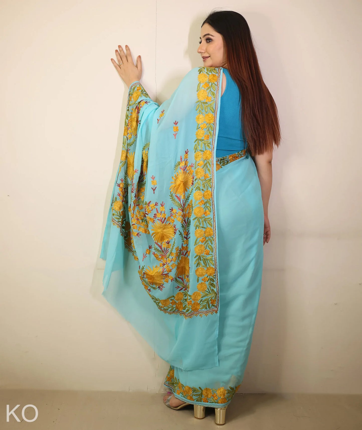 Turquoise Embroidered Georgette Saree