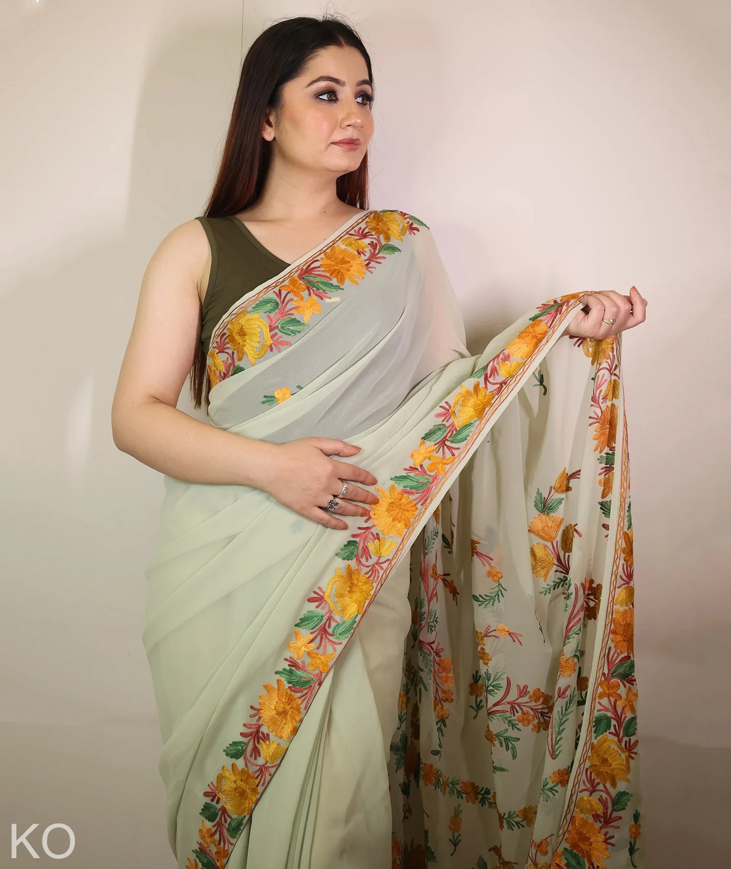 Light Olive Green Shade Embroidered Georgette Saree