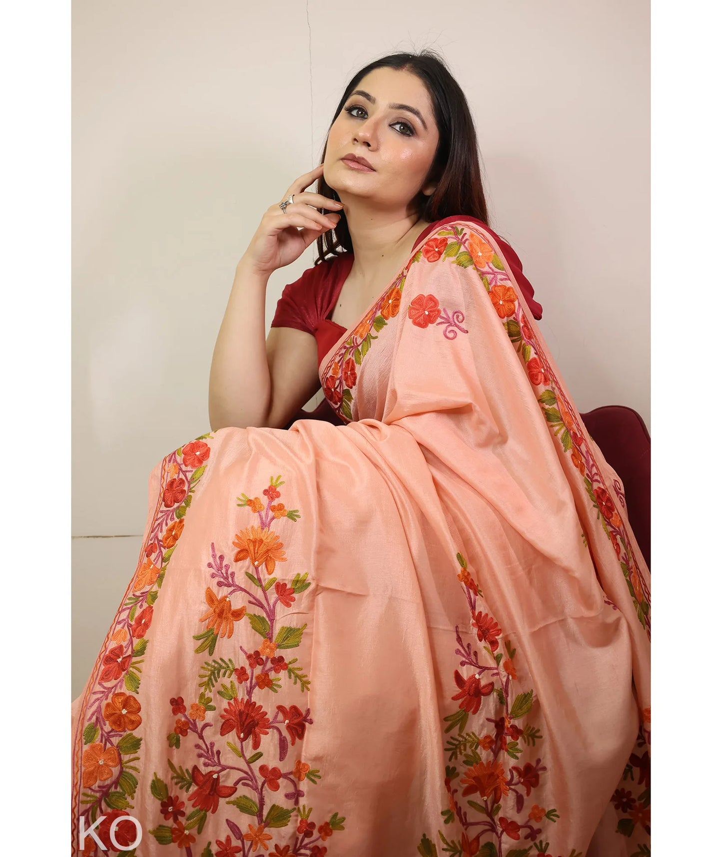 Peach Embroidered Crape Saree