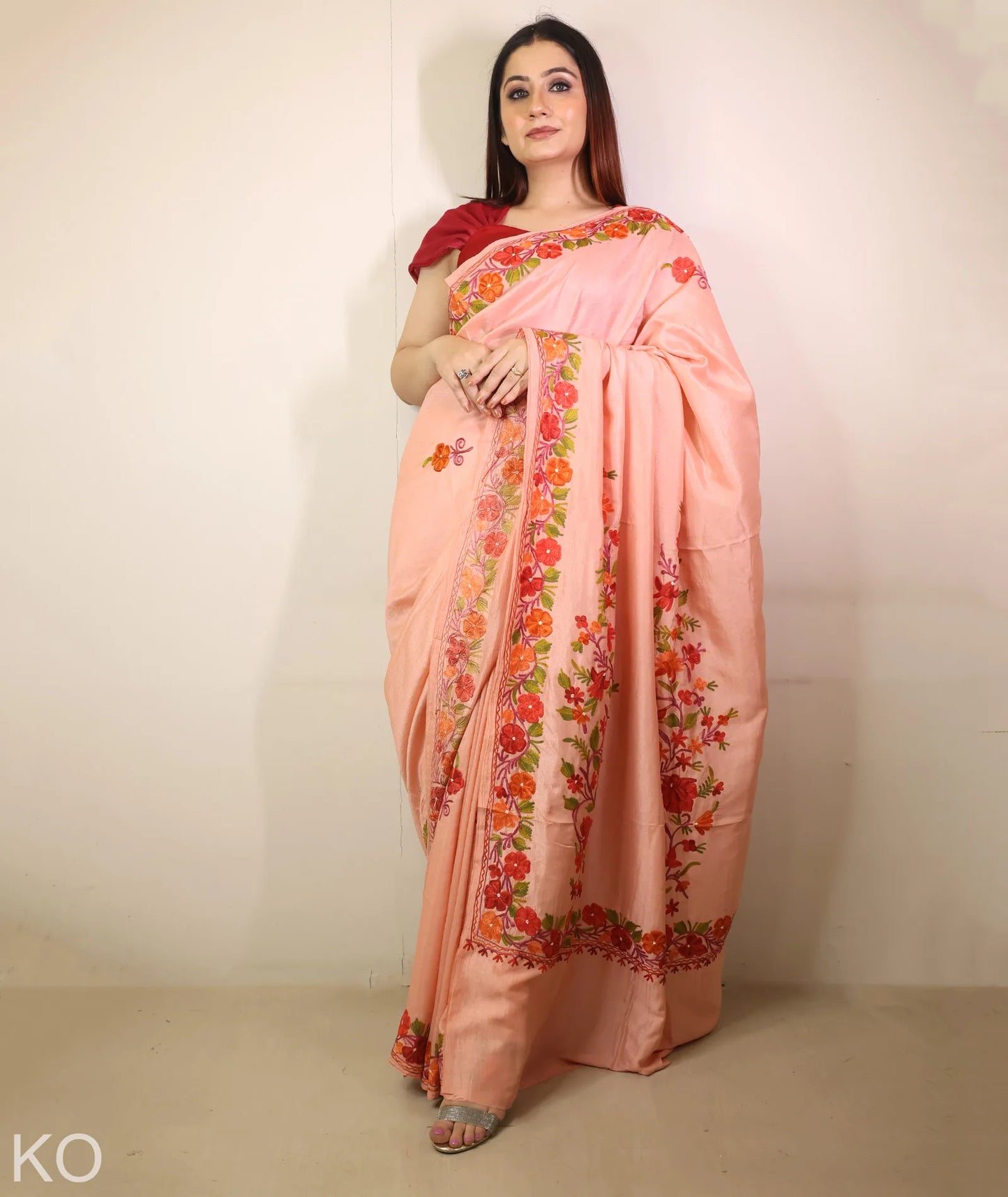 Peach Embroidered Crape Saree