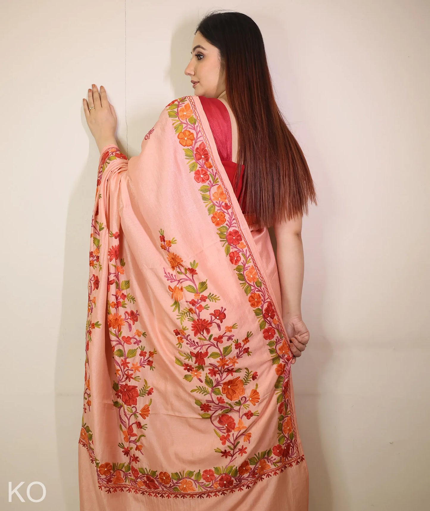 Peach Embroidered Crape Saree