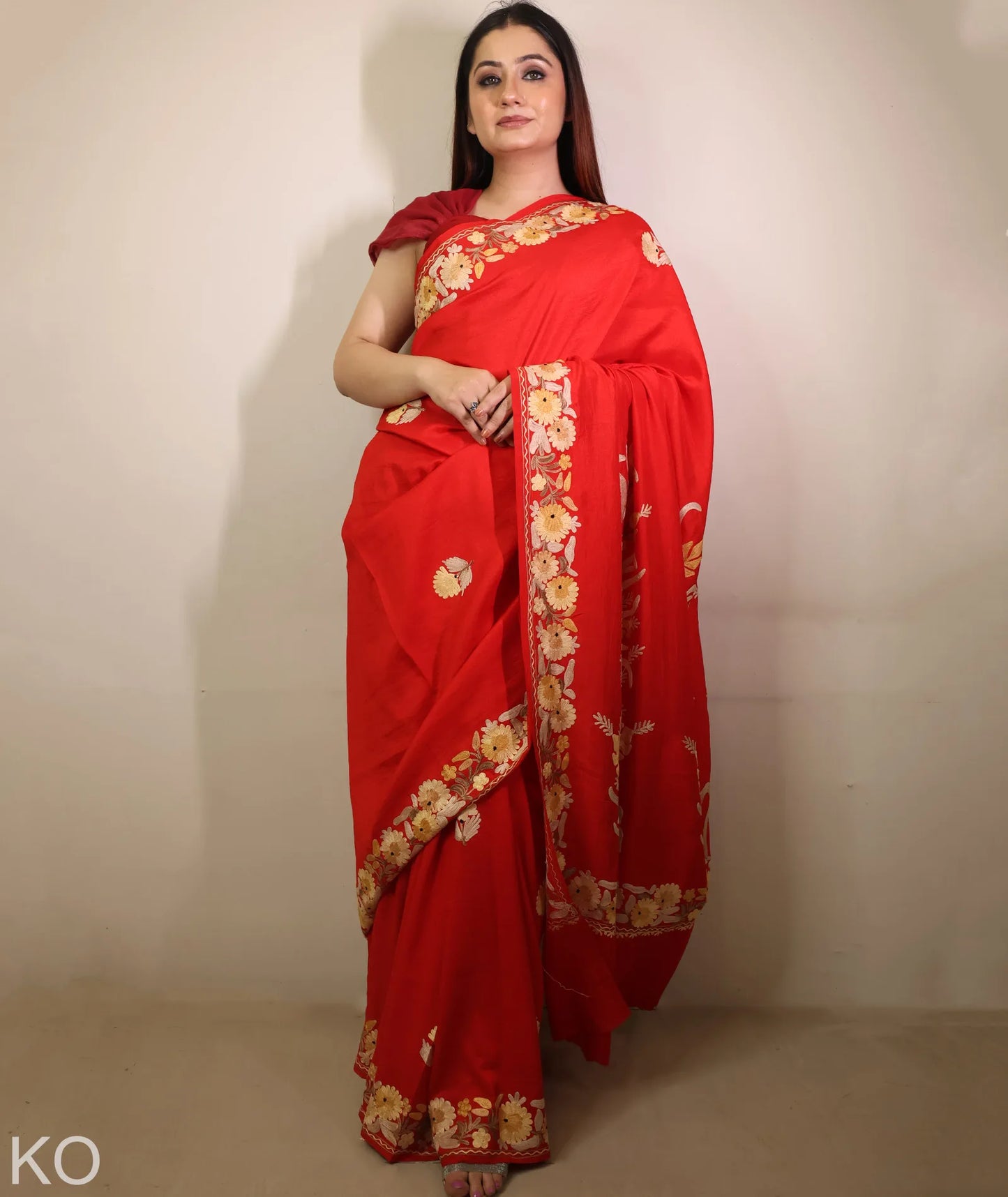 Red Embroidered Crape Saree