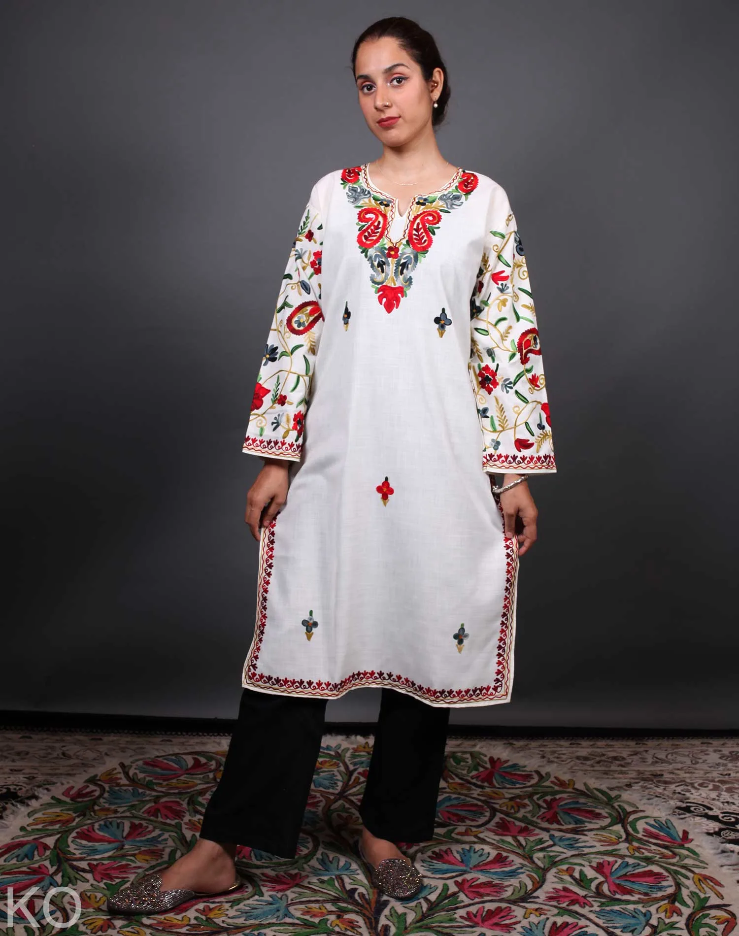 Multicolored Arm Design Aari Embroidered White Cotton Kurti