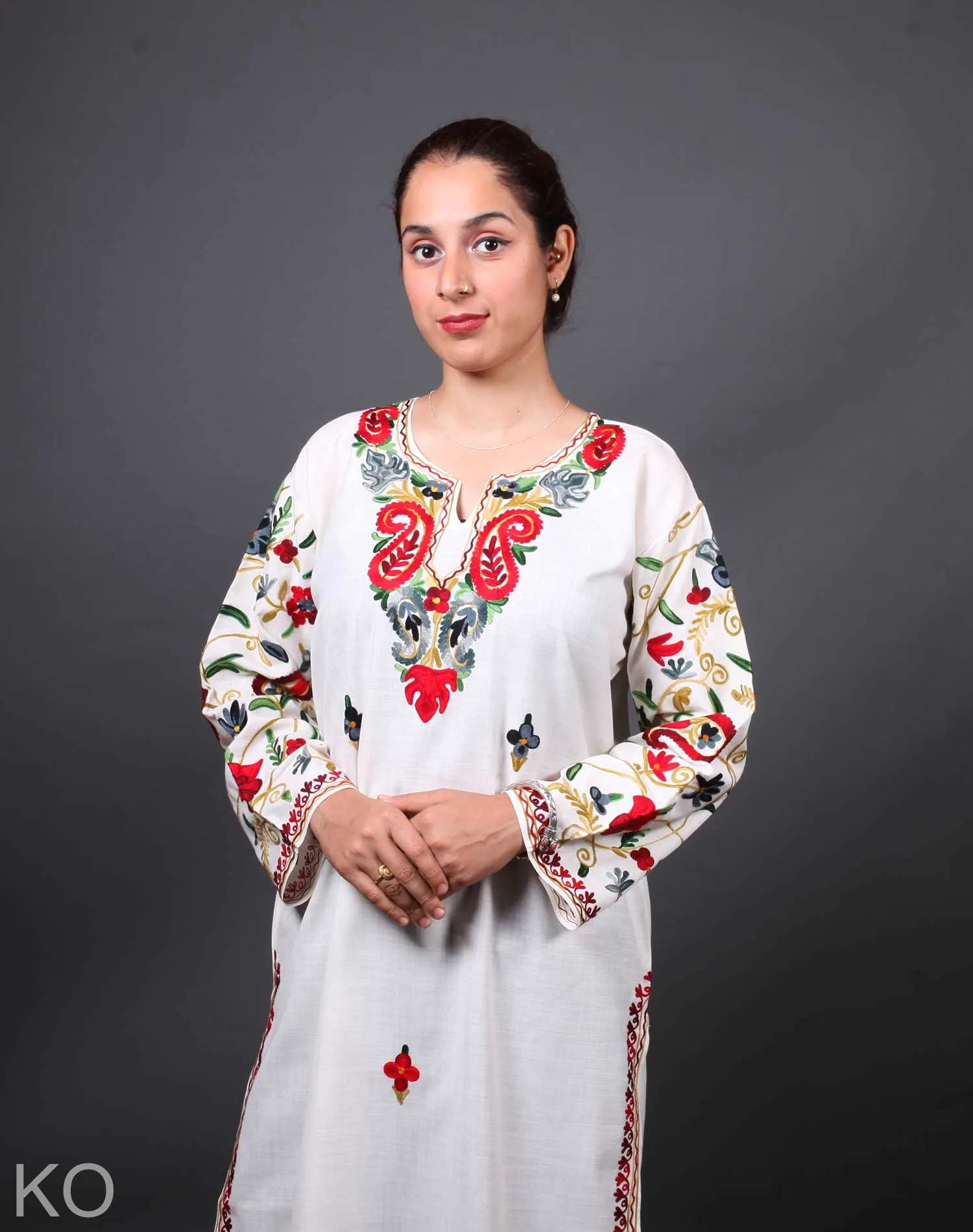 Multicolored Arm Design Aari Embroidered White Cotton Kurti