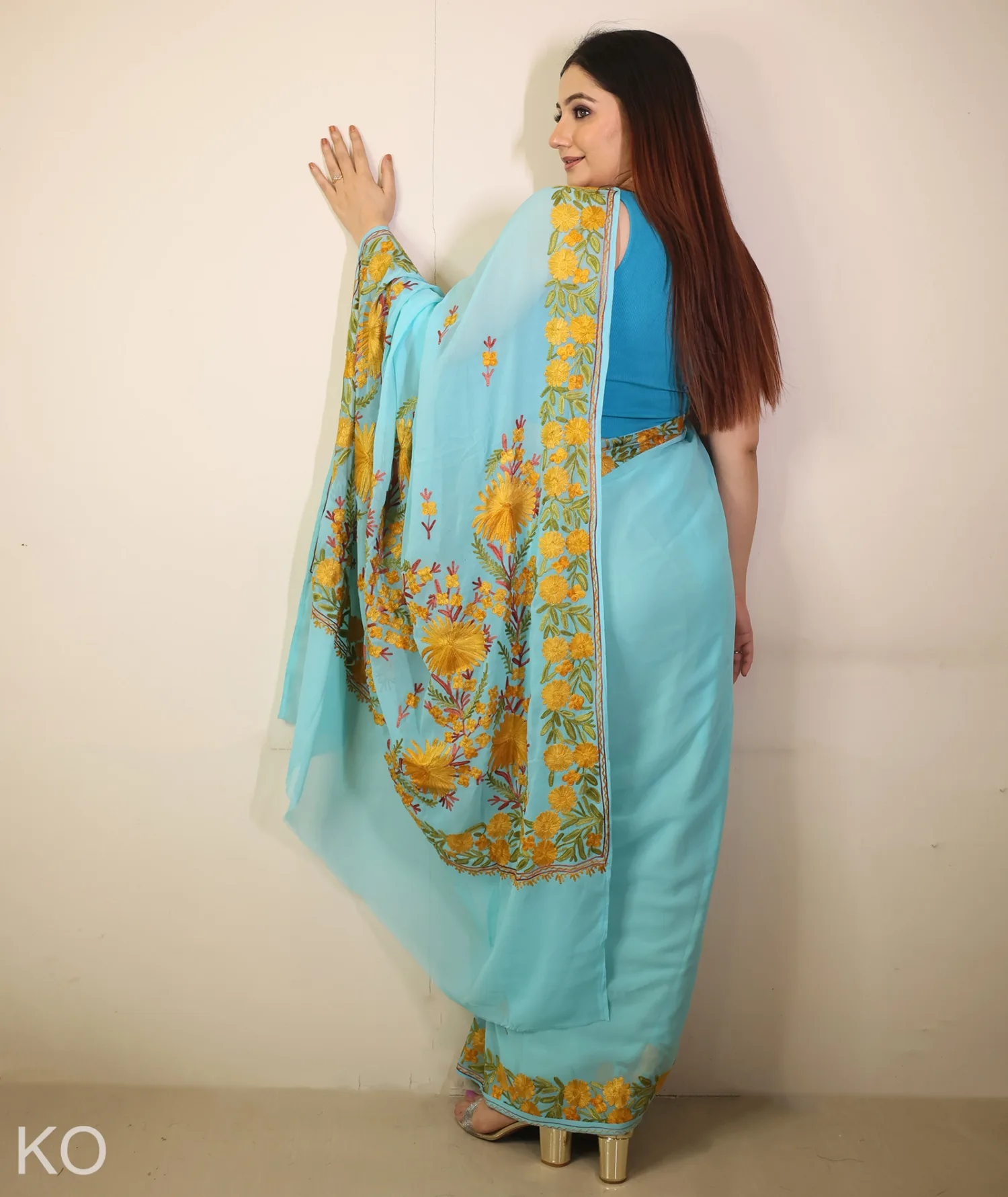 Turquoise Embroidered Georgette Saree